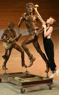 Amy Goodman polishing the finished bronzes of Mick Jagger and Keith Richards in the Grain Store at Project Workshops before installation